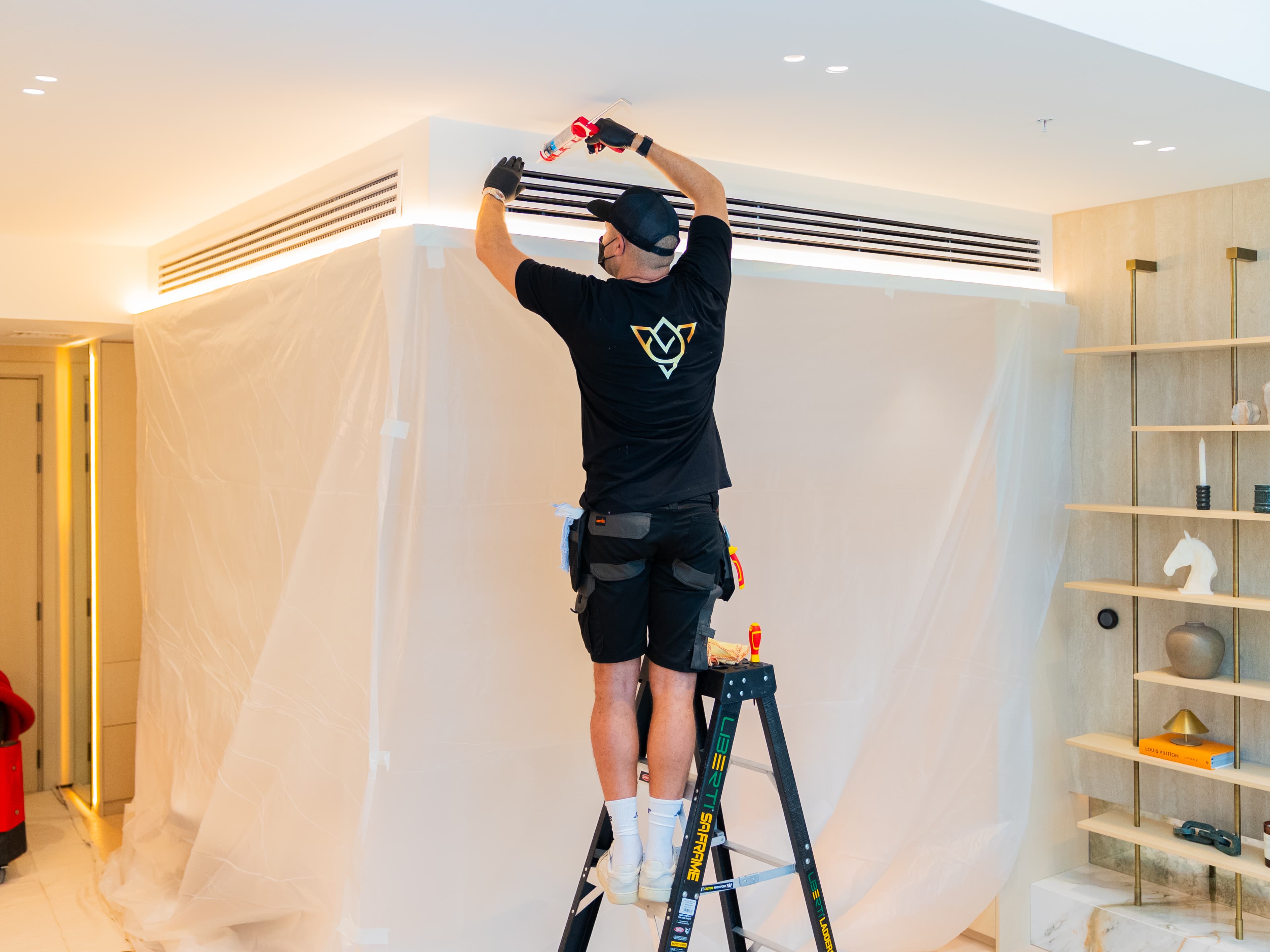 Vita Pro Cleaning engineer working on ductwork in a Dubai villa